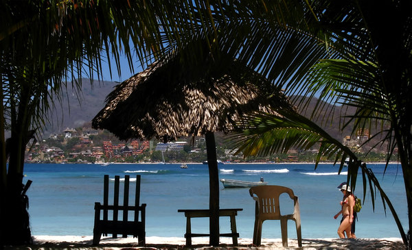 Chairs at beach shore