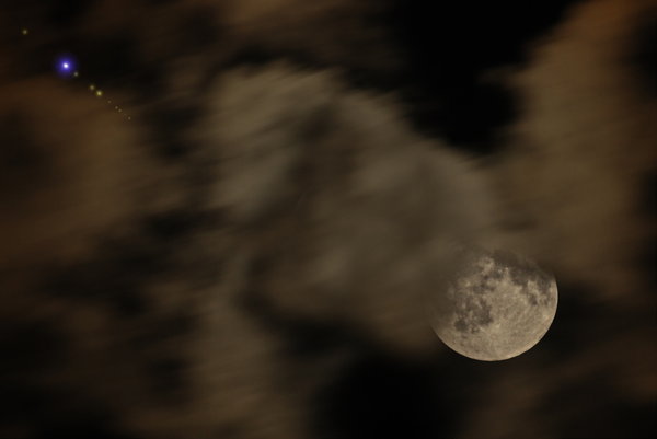 Moon between the clouds 1