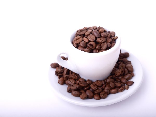 Coffeebeans in espresso cup