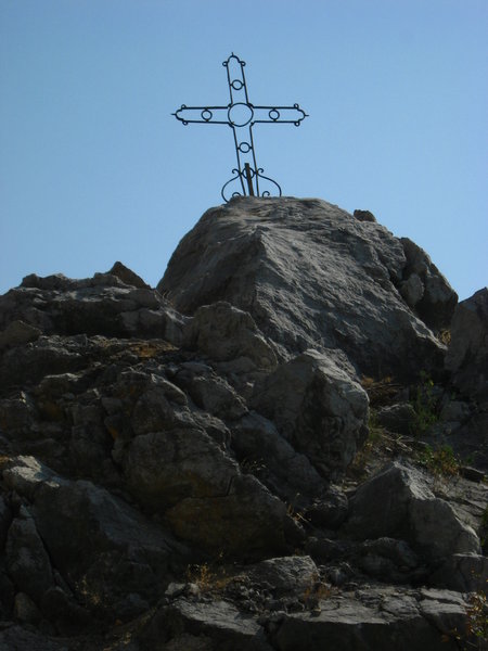 cross on a rock