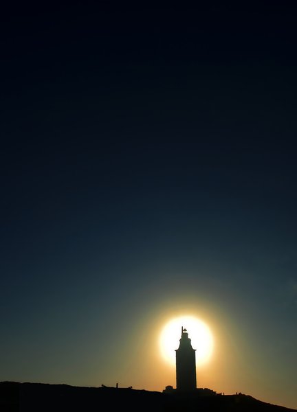 Sun behind the tower