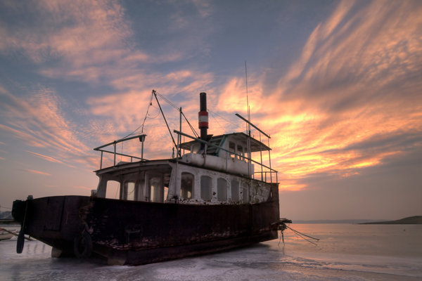 Old ferry in sunset - HDR