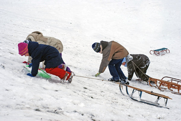 Children playing with sled 2