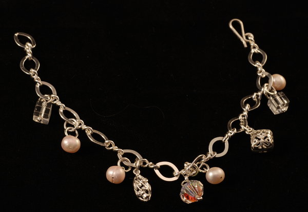 Silver bracelet with pearls an