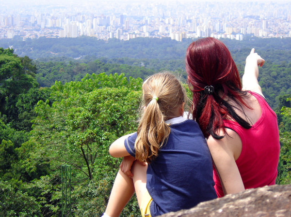 Looking at beyond 2: Two girls looking to São Paulo city from Pedra Branca, SP, Brasil