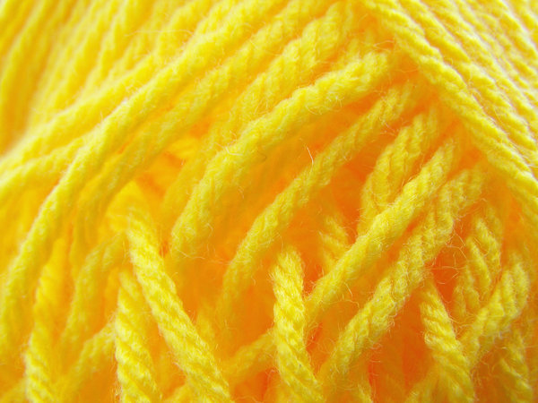 Yellow wool: yellow yarn close up