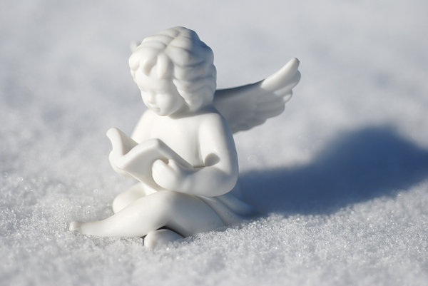 China angel at the winter: China decoration on the snow