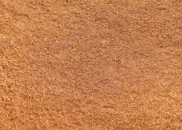 Copper Glitter: Extra fine metallic powders laid out on a sheet and photographed in detail The powders are used to add sparkle and color as pigments In paint. There is a copper and a brass powder.