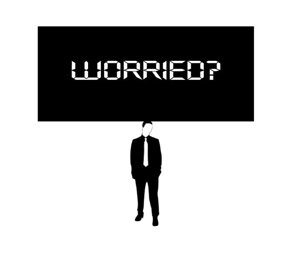 Something on Your Mind 1: Businessman (figure from a free for commercial use vector) with worrying thoughts weighing him down. 