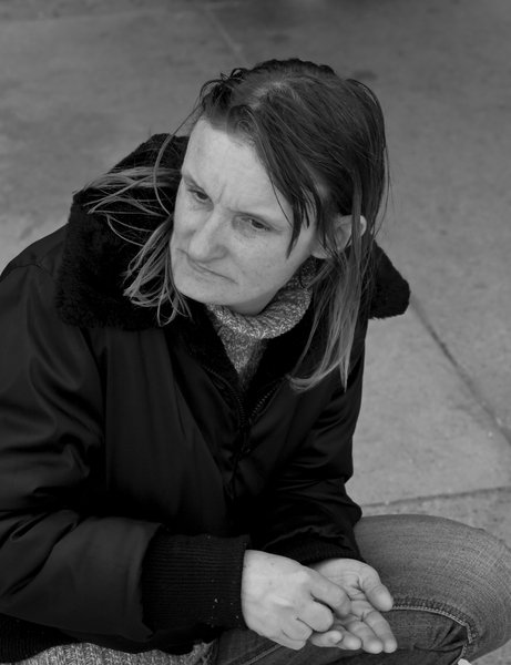 Panhandler: Young woman on street panhandling