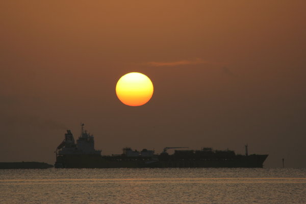 Sunrise with a Ship