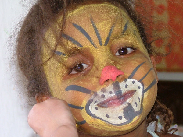 Face Painting: My niece having some fun with face paints