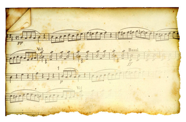 Music Fades: Vintage torn paper with music.