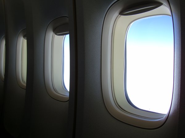 Aircraft Interior: View from within a 747-400 at high altitude over Australia.