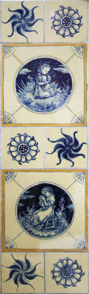 Old blue ceramic tiles. Hand p