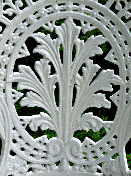 elegance not comfort: white painted cast iron garden seats - chairs