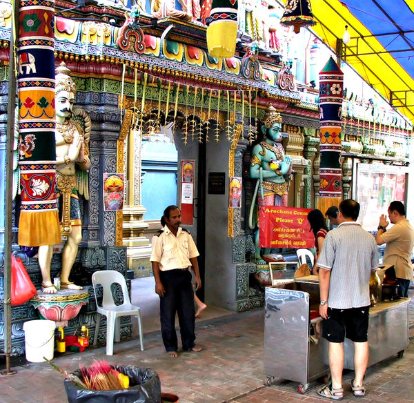 secured temple: barefooted security guard at Hindu Temple