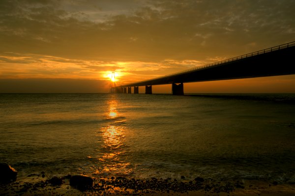 Bridge in sunset - HDR: The Great Belt Bridge in Denmark in october sunset. The picture is HDR.