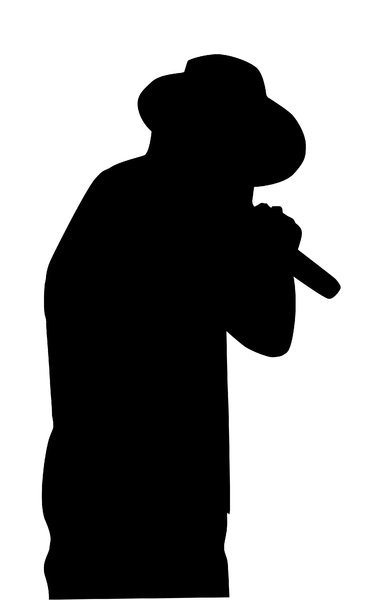 A man in the hat: A man in the hat with a microphone. A silhouette.