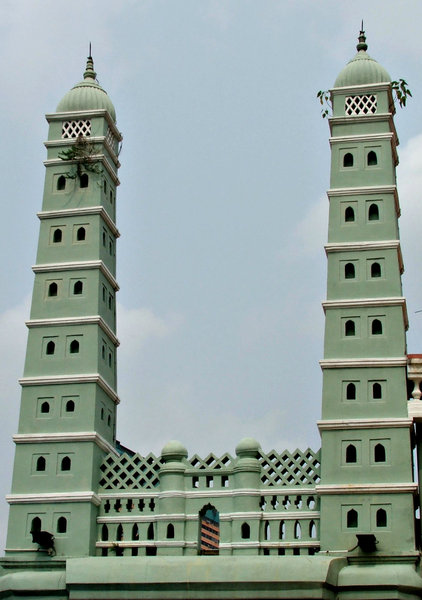 green mosque minarets