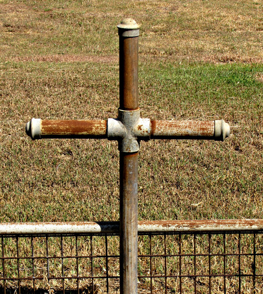 rusty plumber's cross