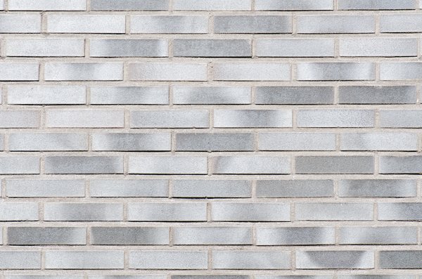 Grey brick wall: detailed brick wall