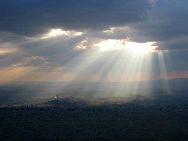 sunbeam: the sun breaking through clouds over new mexico.