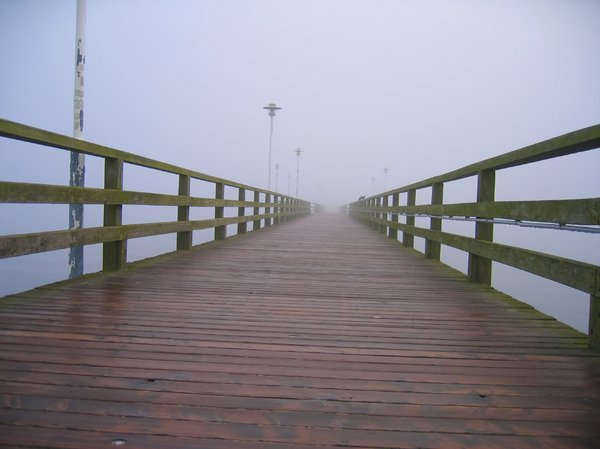 pier in morning mist