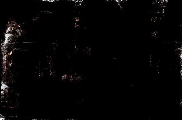 Black Grunge Background: A black, scratched grunge background. Lots of copyspace.