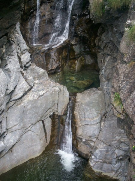 waterfall and stones: mountain little waterfall, Vallantrona, Northern Italy