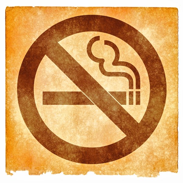 No Smoking Grunge Sign: Grunge textured No Smoking sign on vintage paper, with sepia toning for a more aged feel.