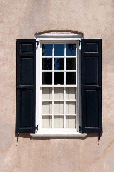 Shuttered Windows: 18th Century shuttered windows, shot in either direct sunlight or filtered light in Charleston, South Carolina, USA