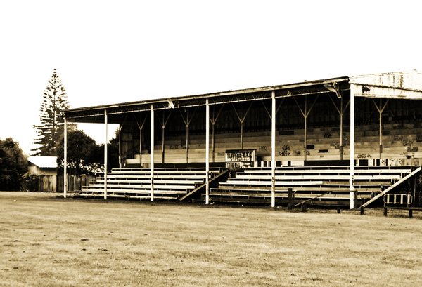 No game today: An empty spectator stand at a rugby field in a country town.  New Zealand