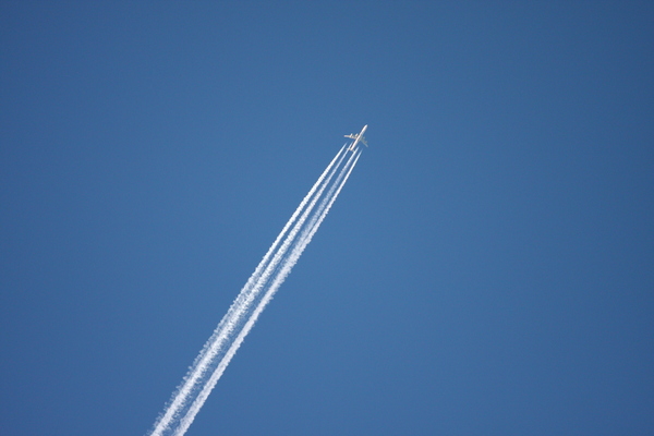 Jet with contrails