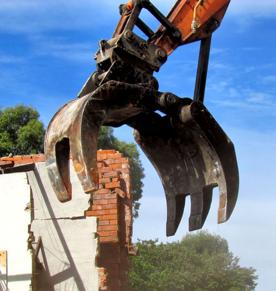 demolition5: excavator demolishing former suburban community centre