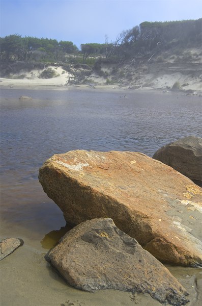 rocks over lake