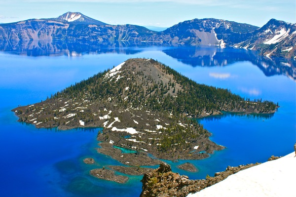 Crater lake view: view of crater lake, still weather with snow tops