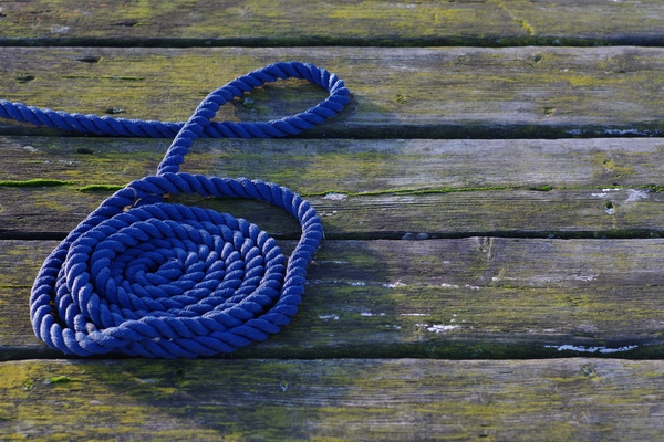 Blue cordage on planks