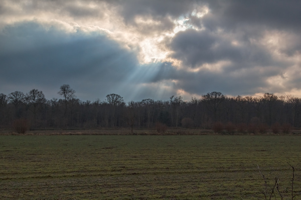 Sun shining through clouds