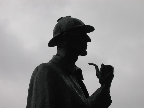 The Great Detective: Sherlock Holmes statue at Baker Street Station in rainy London, UK