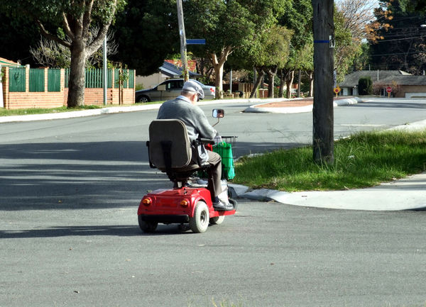 senior's transport: senior citizen on electric gopher