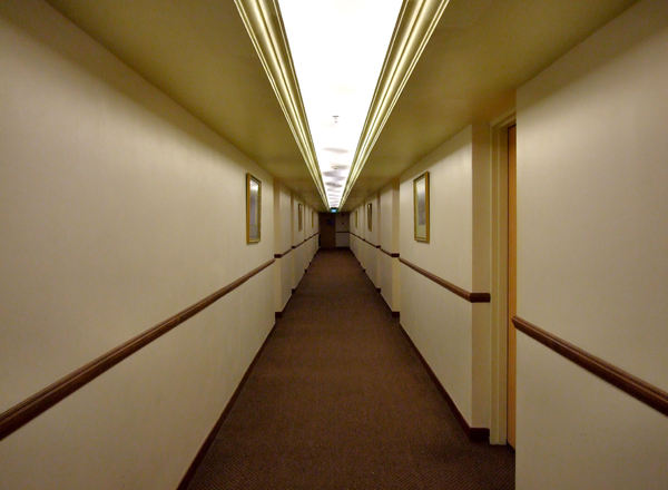 hostel passageway: hostel accommodation rooms along passageway