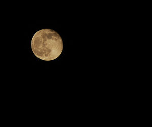 Moon: Shot of an almost full moon, against a black sky