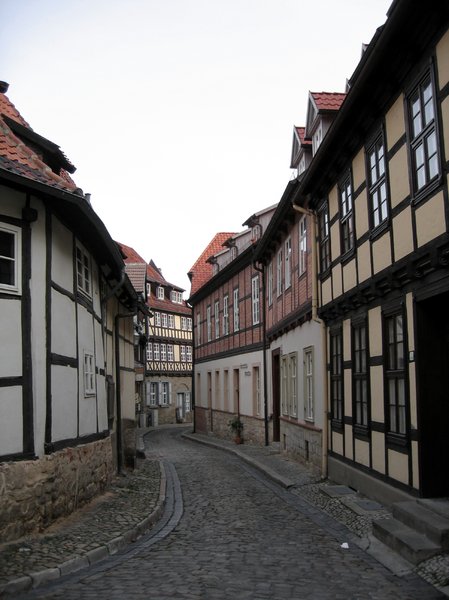 old and winding rural lane: An old and winding rural lane in Quedlinburg, Germany. There are lots of half-timbered houses in this beautiful old city.