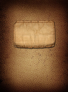 Leather Cover 2: Lo Res variations on a leather book cover with a jeans tag.Please visit my stockxpert gallery:http://www.stockxpert.com ..