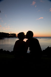 Kissing couple: couple kissing during Hawaiian sunset