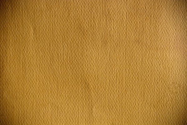 Textured Brown Paper: Brown paper with a distinctively rough texture.