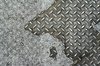SF Diamond Plate: Diamond plate metal on a San Francisco sidewalk.