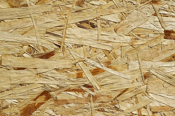 OSB wood panel: Oriented strand board texture.