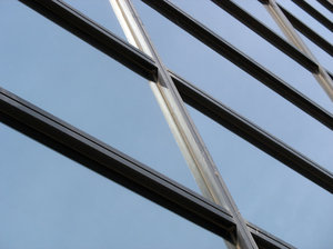 blue glass: the reflection of blue sky in a glass building facade.